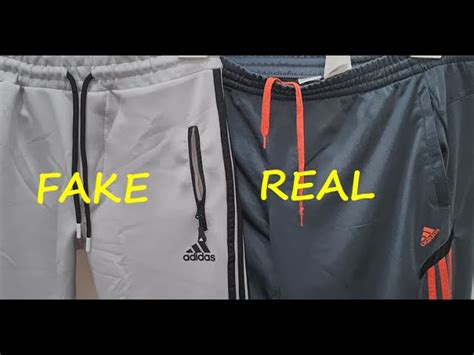 fake adidas tracksuits|adidas authenticity check code.